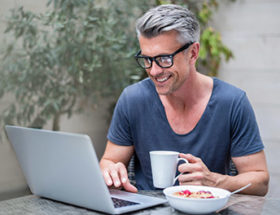 man completing his personality test online