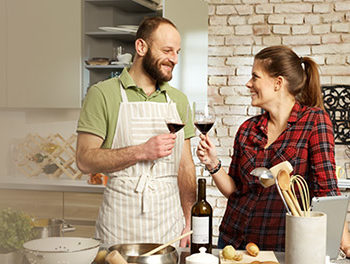 Couple cooking an aphrodisiac dinner