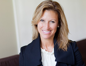 Female executive smiling at the camera