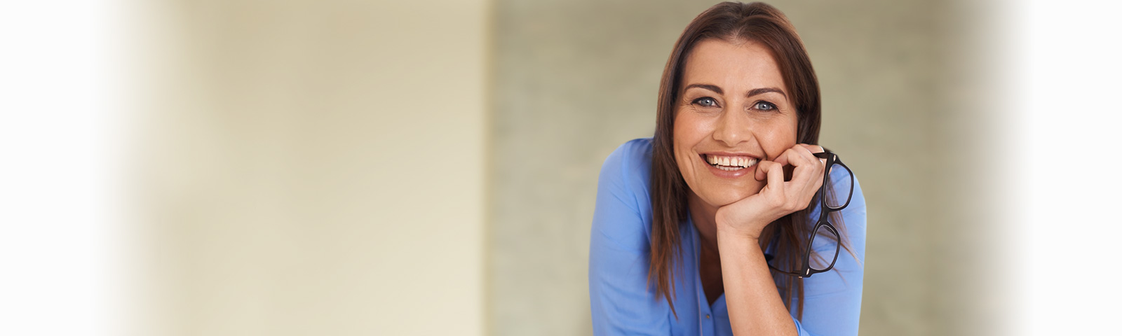 siingle professional woman in a blue shirt