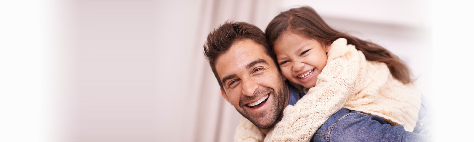 Single dad with happy daughter