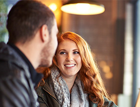 Couple on a date in a Dunedin coffee shop