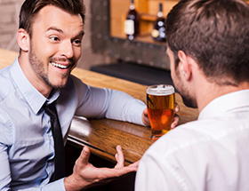 two men on a date in a craft beer bar